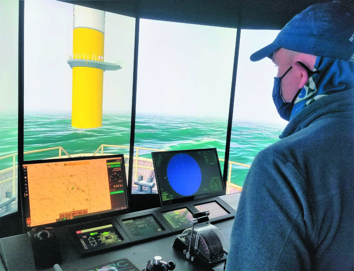 TAKING CAPTAINS TO SCHOOL: Capt. Patrick Cassidy, charter captain and captain’s school instructor, maneuvers around a pylon in the Revolution wind farm using a training simulator.